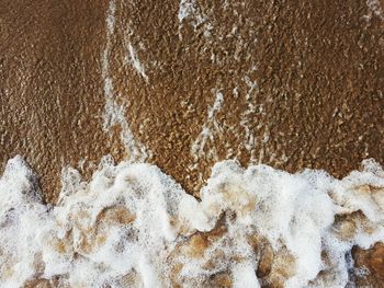 Full frame shot of sand on beach