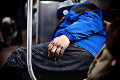 Midsection of man lying down