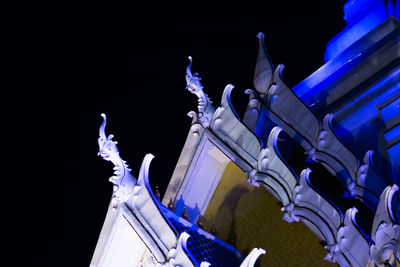 Low angle view of temple against sky at night