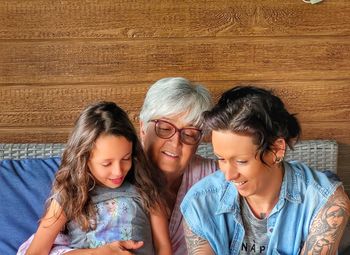 Close-up of mother and daughter at home
