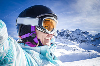 Woman in ski gear on mountain