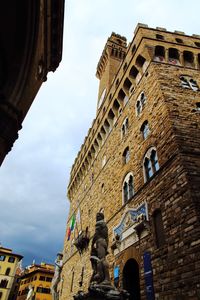 Low angle view of historic building against sky