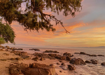 Scenic view of sea against sky during sunset