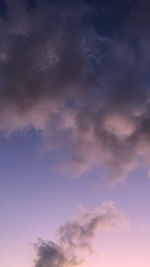 Low angle view of cloudy sky during sunset