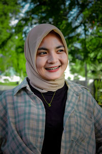 Portrait of a smiling young woman