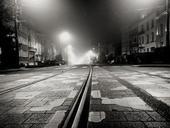 View of illuminated street at night