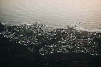 High angle view of cityscape by sea