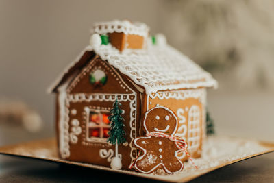 Close-up of model house on table