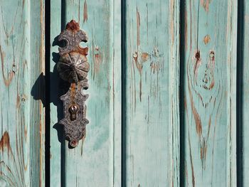 Full frame shot of weathred wooden door