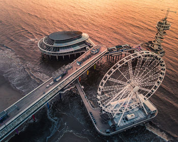 High angle view of ferris wheel in city