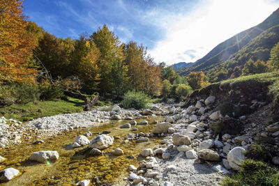 Scenic view of stream against sky