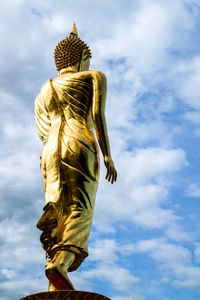 Low angle view of statue against sky