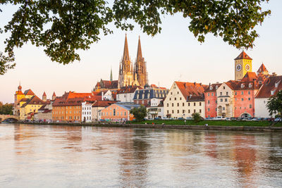 Regensburg in germany, view to the old town with the danube river in the foreground