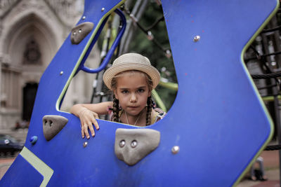 Portrait of girl playing in playground