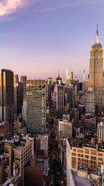Cityscape against sky during sunset