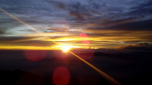 Sun shining through clouds