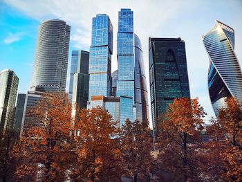 Low angle view of modern buildings against sky