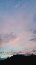 Scenic view of silhouette landscape against sky during sunset