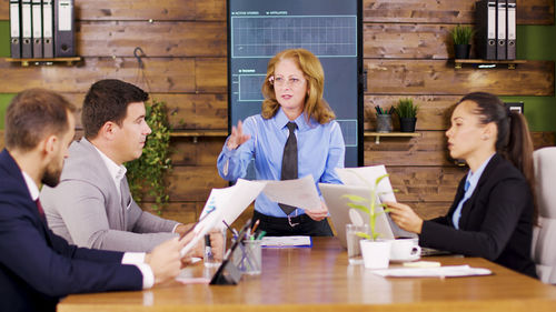 Business colleagues working at office