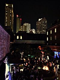 High angle view of illuminated cityscape at night