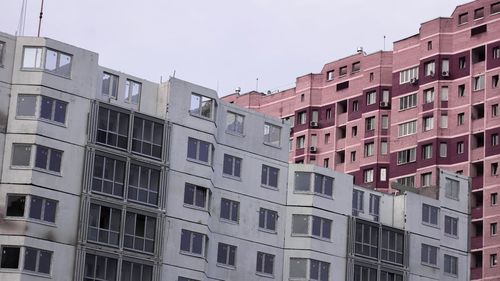 Low angle view of residential buildings against sky