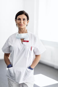 Female doctor looking at camera