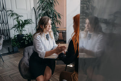 Empathy, friendly support, each other's support and sisterhood. young woman comforting 