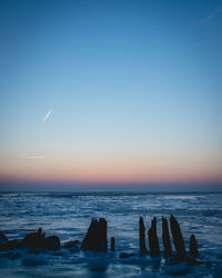 Scenic view of sea against clear sky