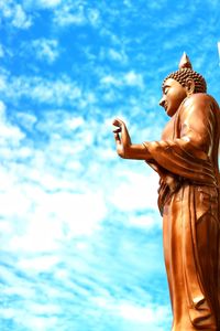 Low angle view of statue against sky