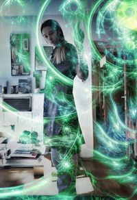 Digital composite image of woman using smart phone