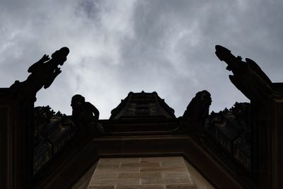 Low angle view of statue against sky