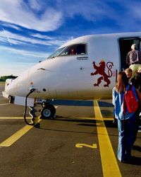 Man on runway against sky