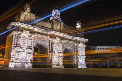 Light trails on bridge at night