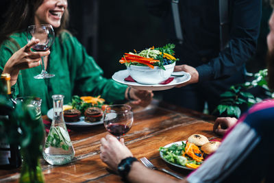 Food amidst couple dating in restaurant