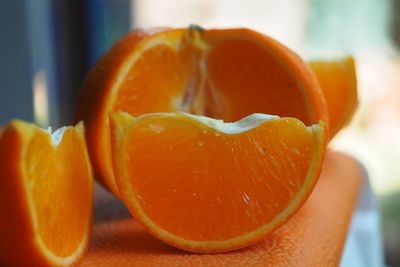 Close-up of orange slices on table