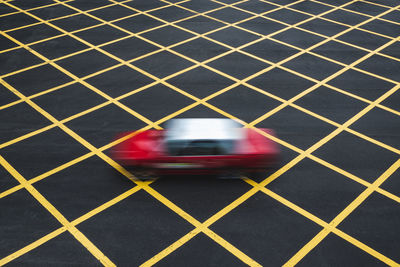 High angle view of yellow car on road