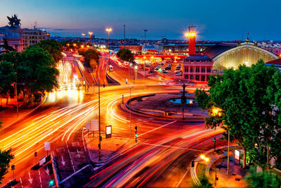 High angle view of light trails on city street at night