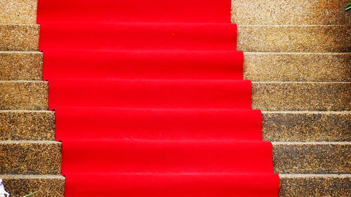 Full frame shot of steps with red carpet