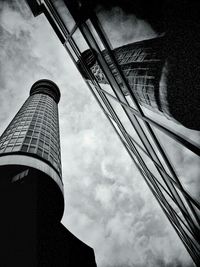 Low angle view of building against cloudy sky