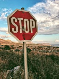Stop sign on landscape
