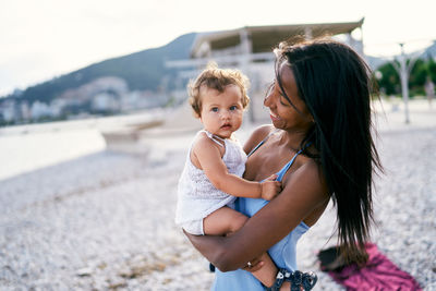 Mother and daughter at beach