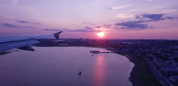 High angle view of sea against sky during sunset