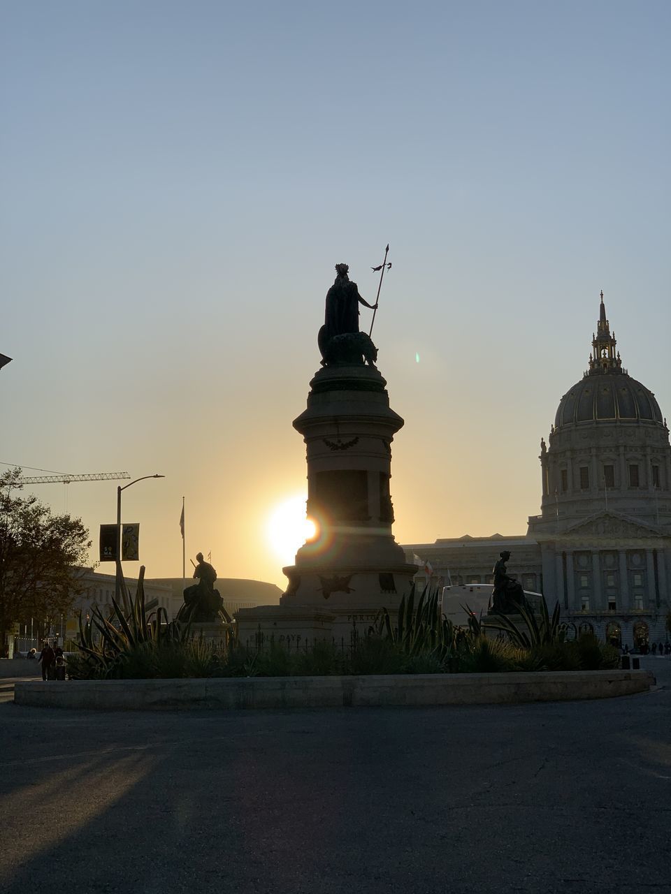 BUILDINGS AGAINST SKY AT SUNSET