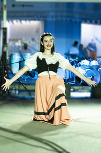 Young girl wearing italian traditional clothing