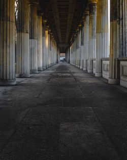 Colonnade in empty corridor