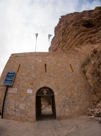 Low angle view of historical building against sky