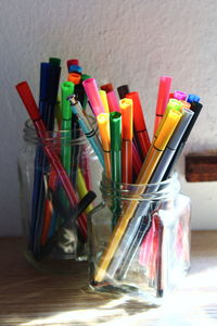 Close-up of paintbrushes on table