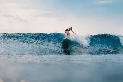 Man surfing in sea