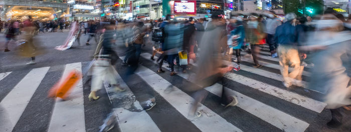 People walking on city street