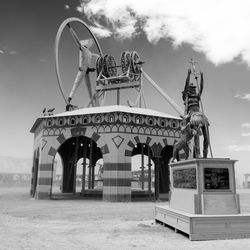 Low angle view of sculpture against sky